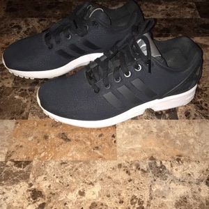 Black Adidas Torsion